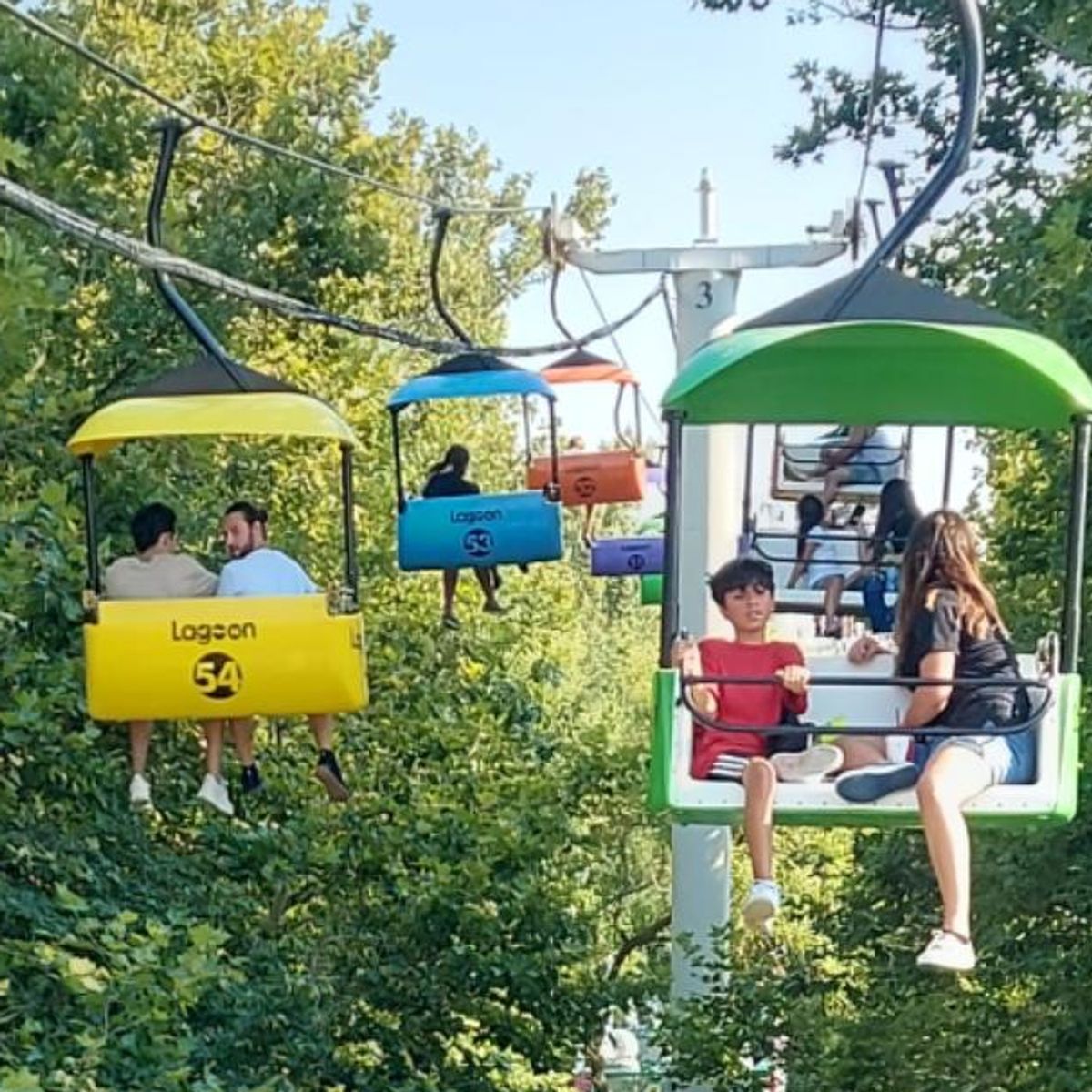 Sky Ride cabins through the trees